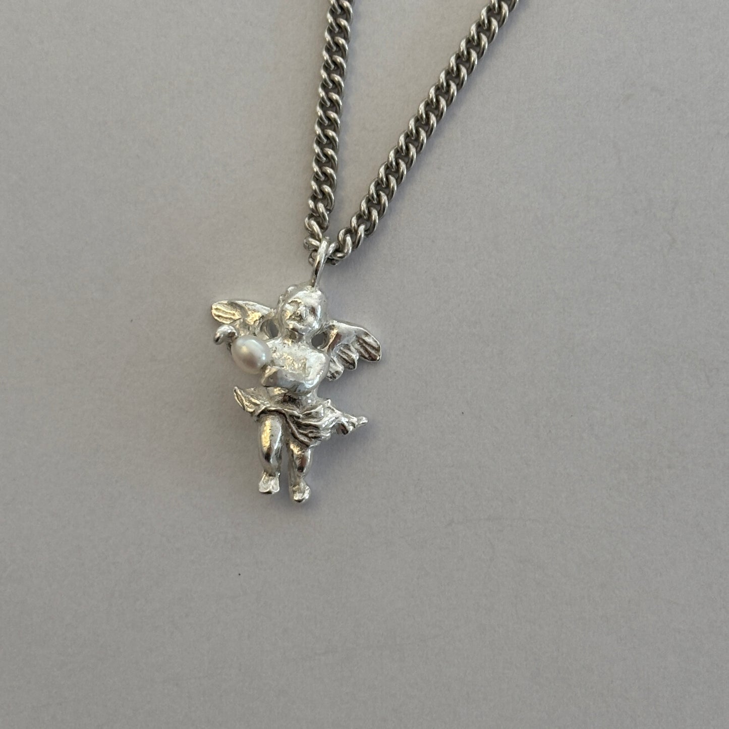 Cherub with Pearl